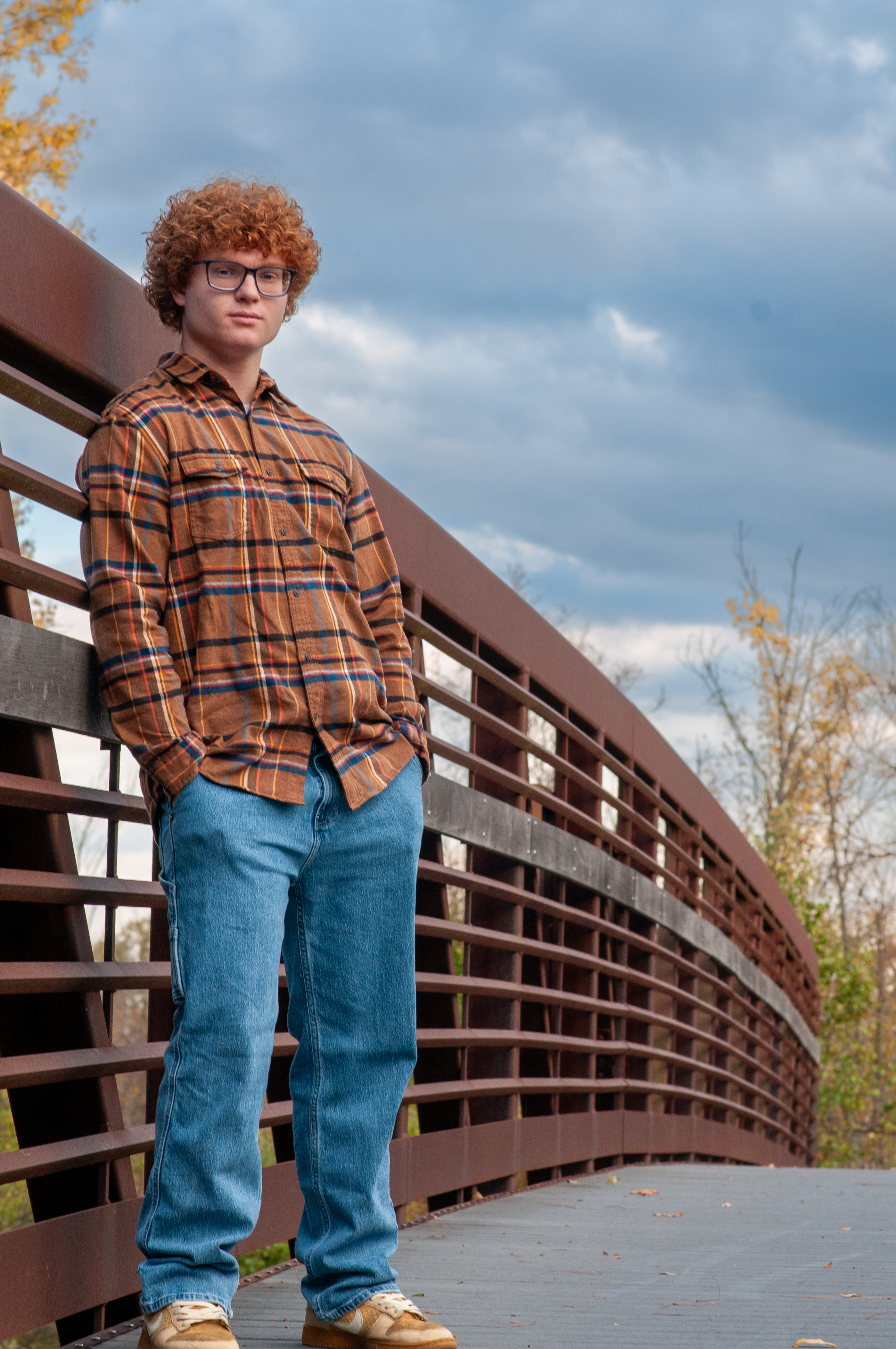 Kellen standing on a bridge